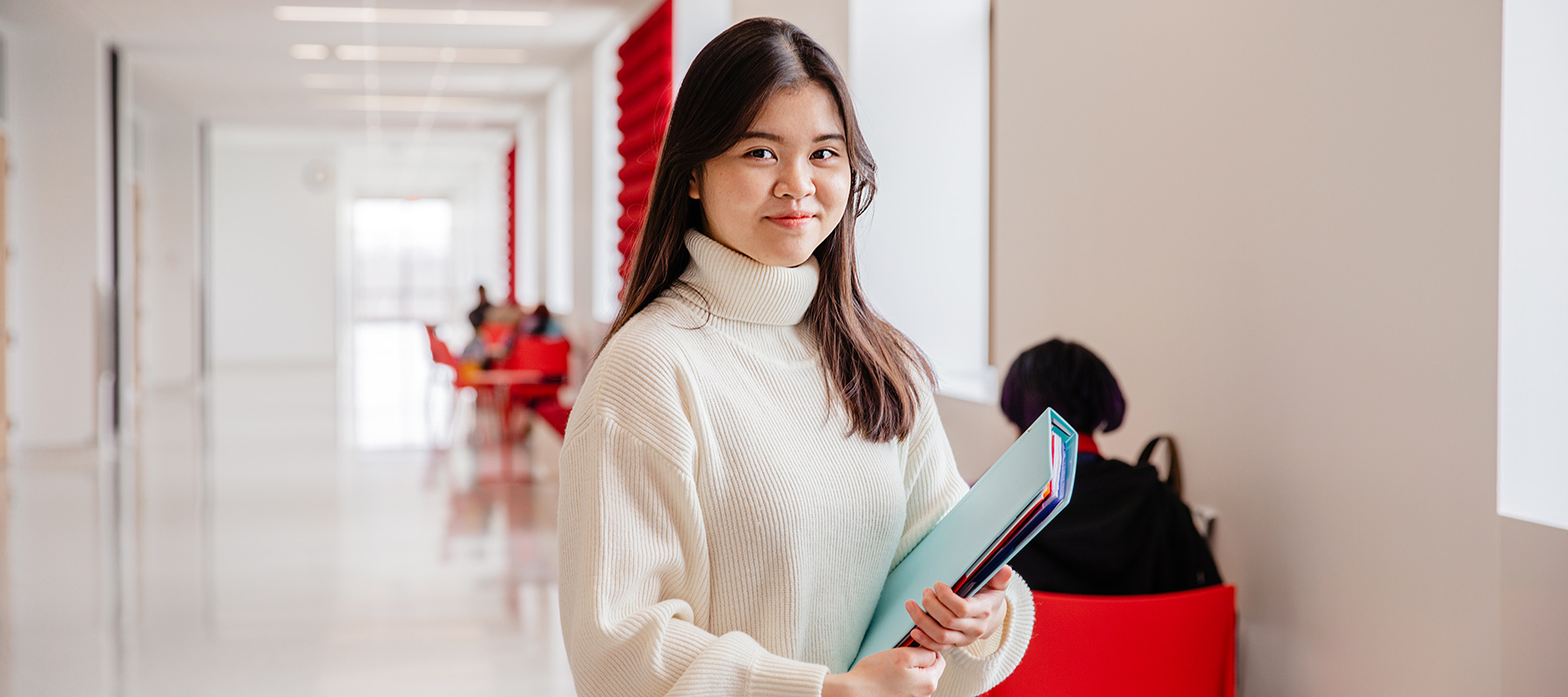 Student in the Normandale Admissions office