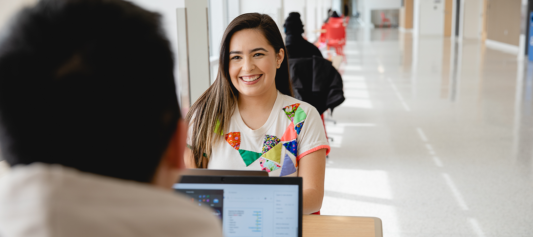 Female student going through the college admissions process. 