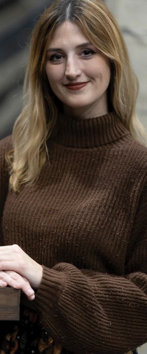 A Normandale student smiles at the camera
