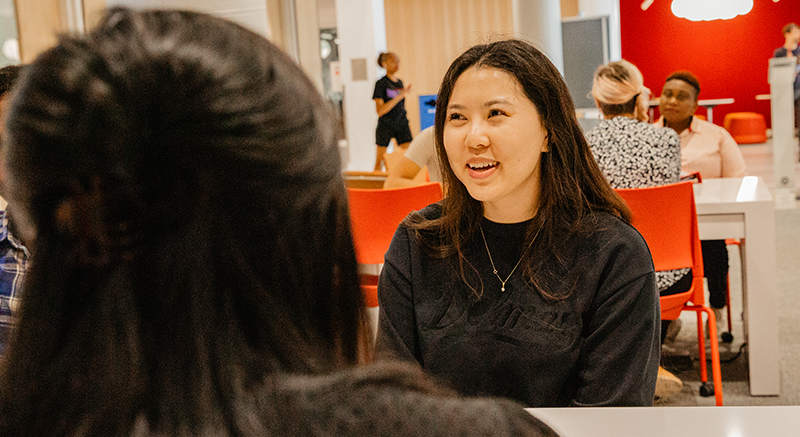 A Normandale student speaks with an Advisor. 