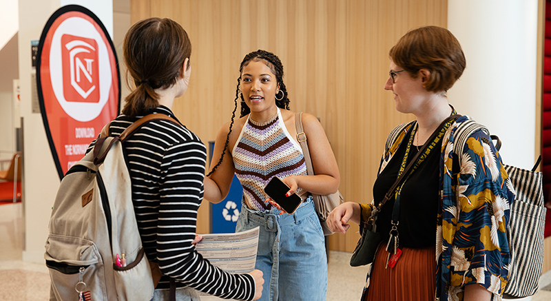 Students chat in a circle at Normandale, which is one of the largest Minnesota Community Colleges.