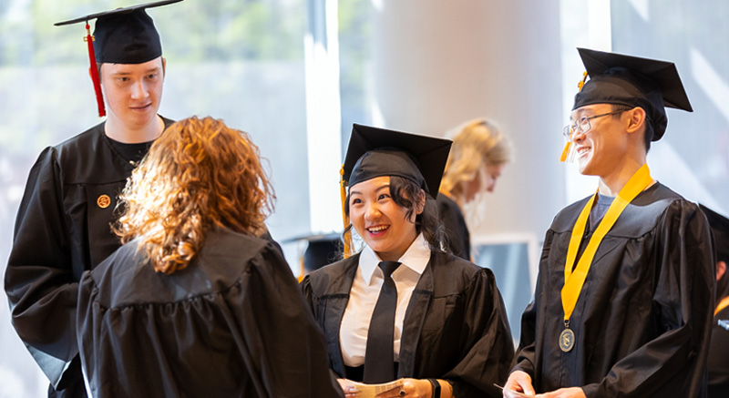 Students in cap and gown at Normandale, one of the most affordable colleges in Minnesota. 